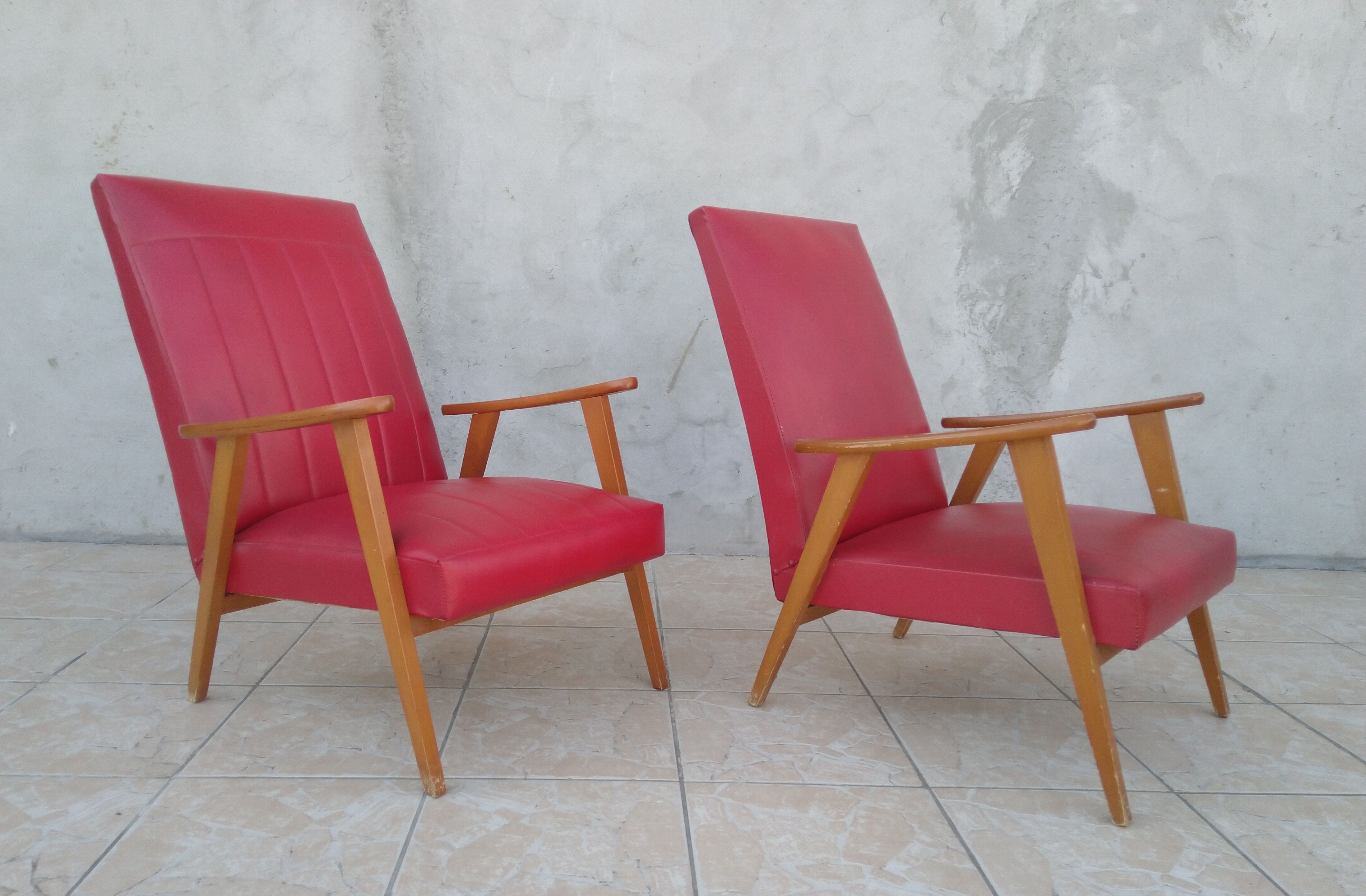 Paire de fauteuils vintage en skaï