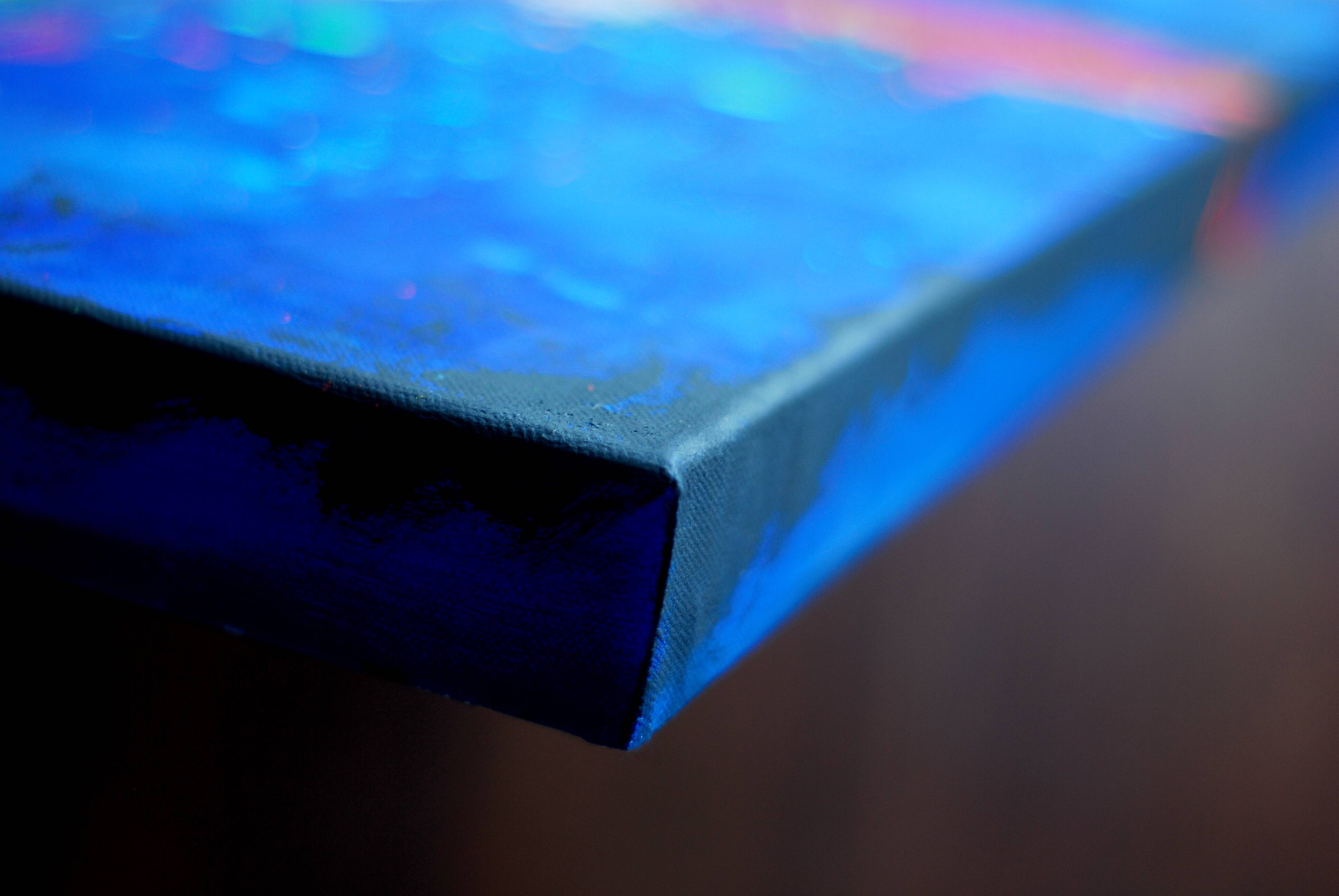 Abstract blue and red colors acrylic painting on stretched canvas
