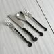 Set of 4 hammered metal cutlery with snail pattern.