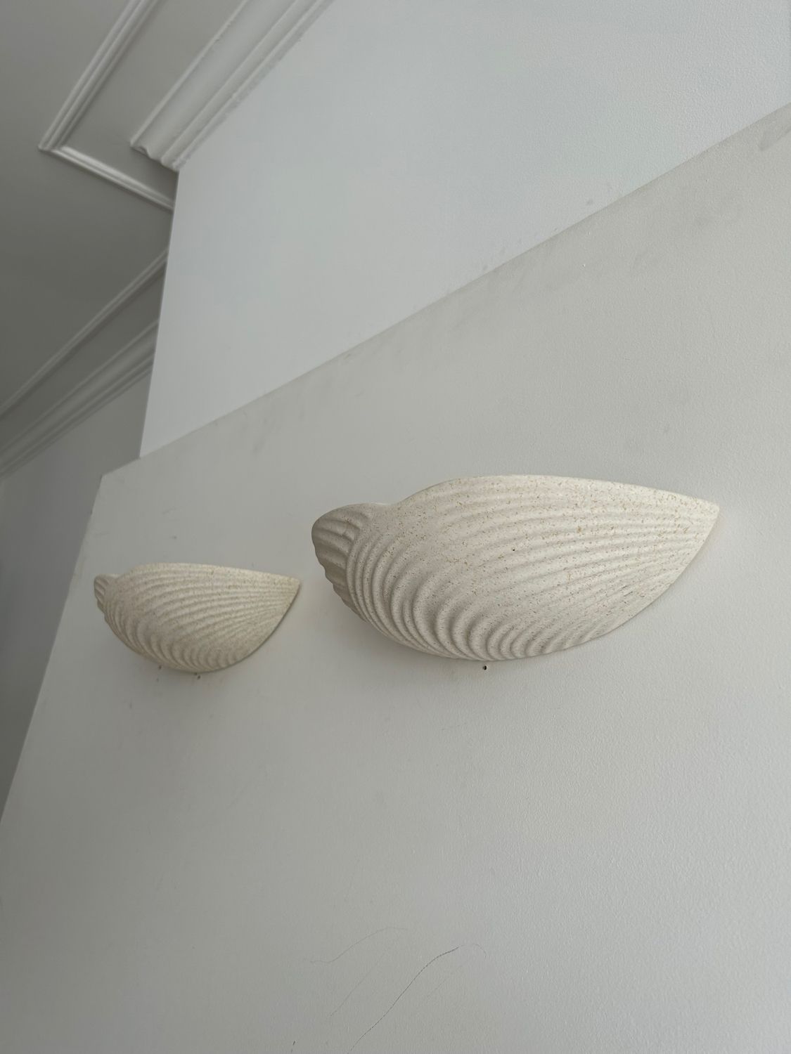Pair of wall lamps in molded plaster France 1980