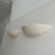 Pair of wall lamps in molded plaster France 1980