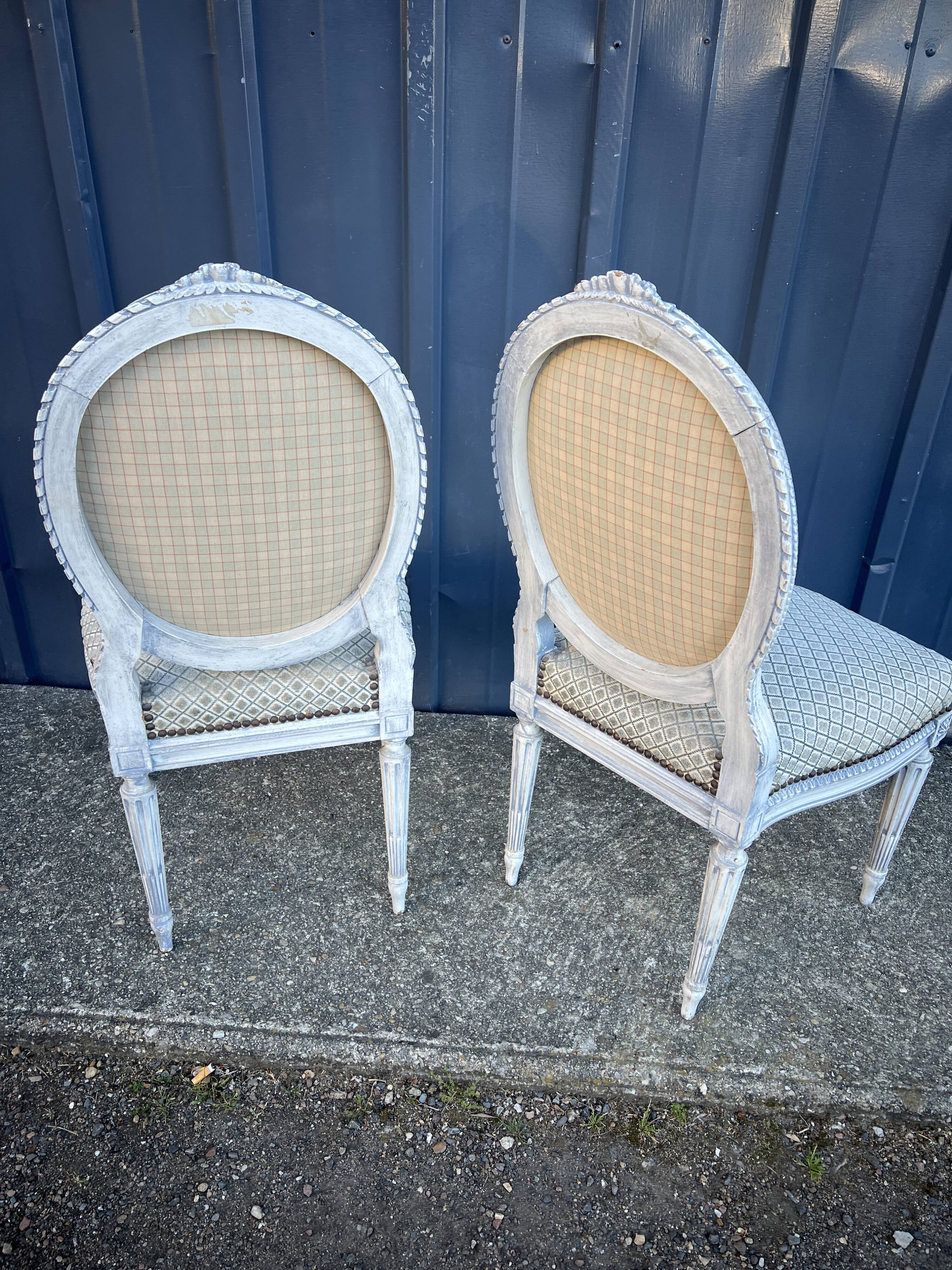 Pair of lacquered Louis XVI style chairs