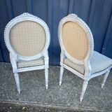 Pair of lacquered Louis XVI style chairs