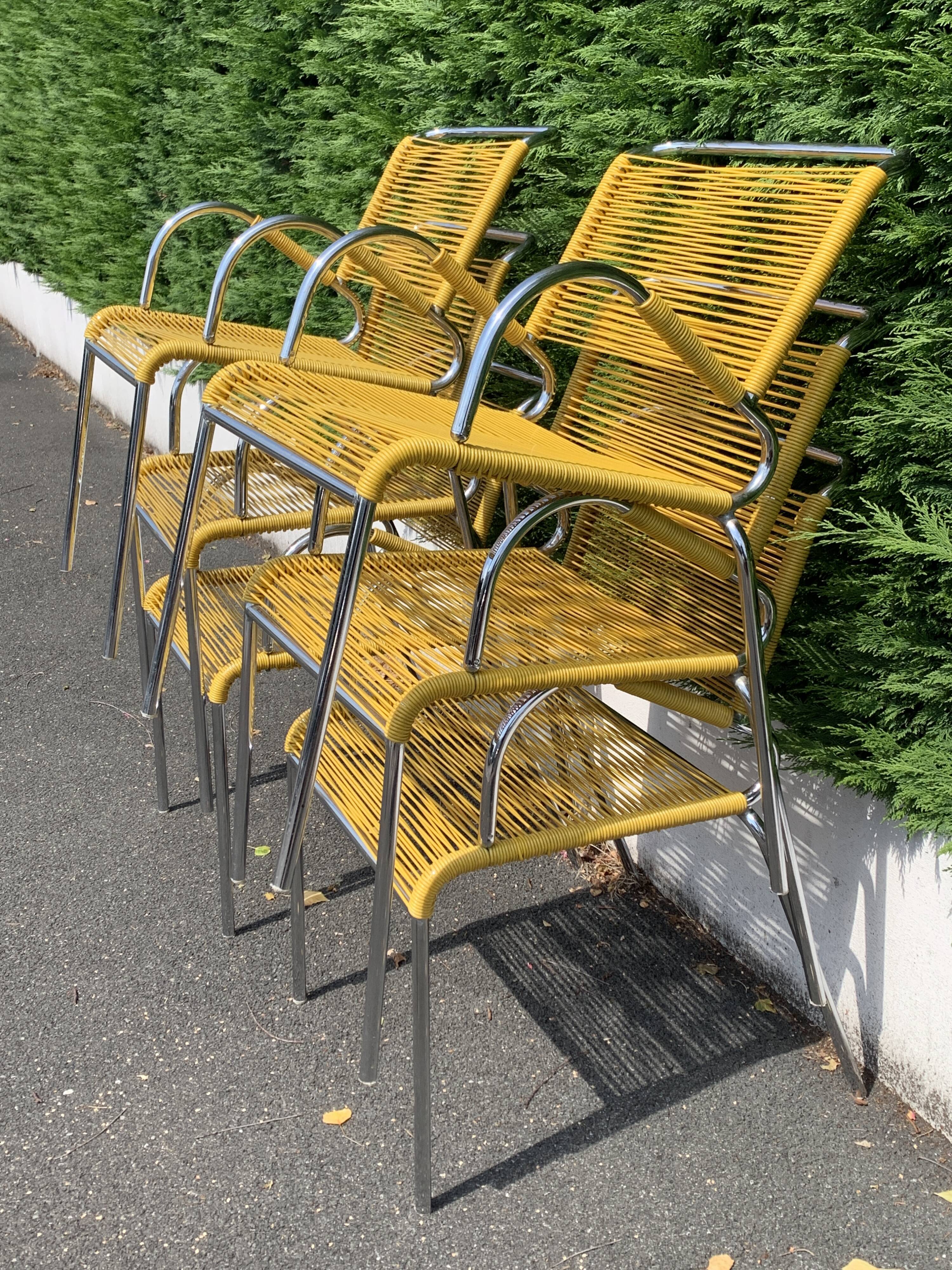 6 yellow and stackable armchairs, scoubidou by Dupré Perrin