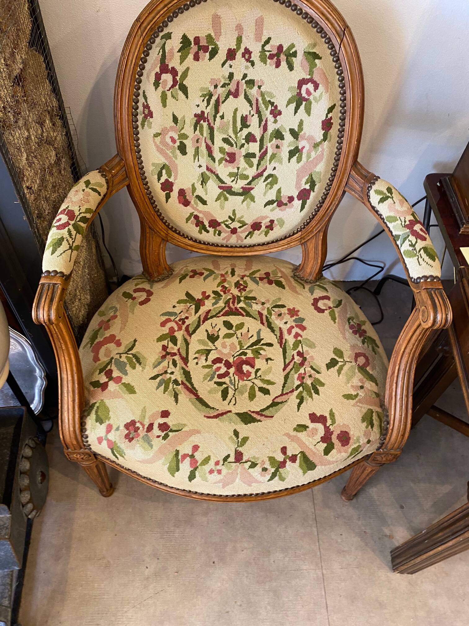 Louis XVI style medallion armchair with floral needlepoint tapestry
