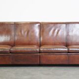 Sturdy and large vintage sheepskin design 4-seater sofa with a sleek look