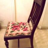 Wooden chair with embroidered seat
