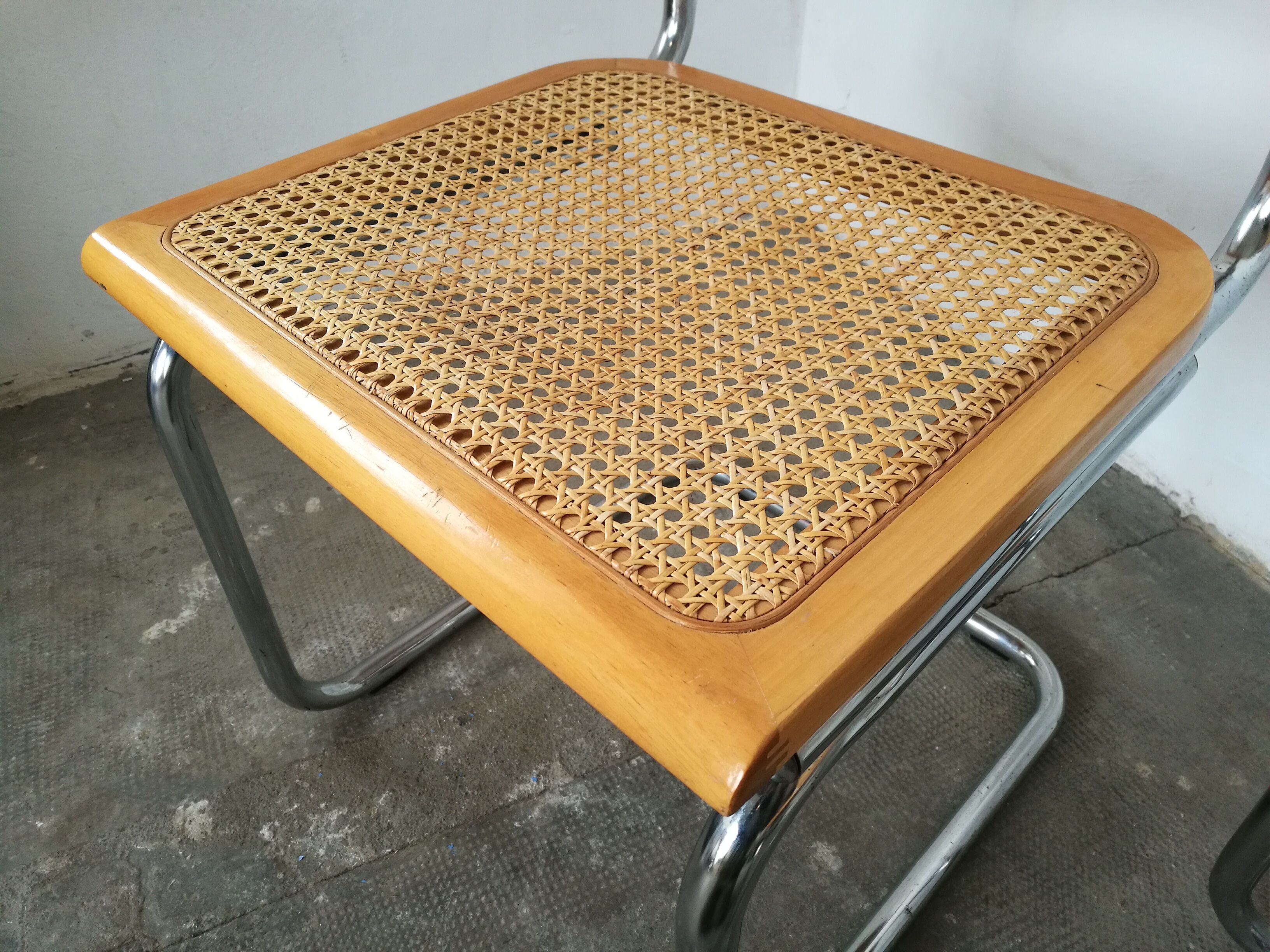Pair of chairs, canning and chrome tubular metal