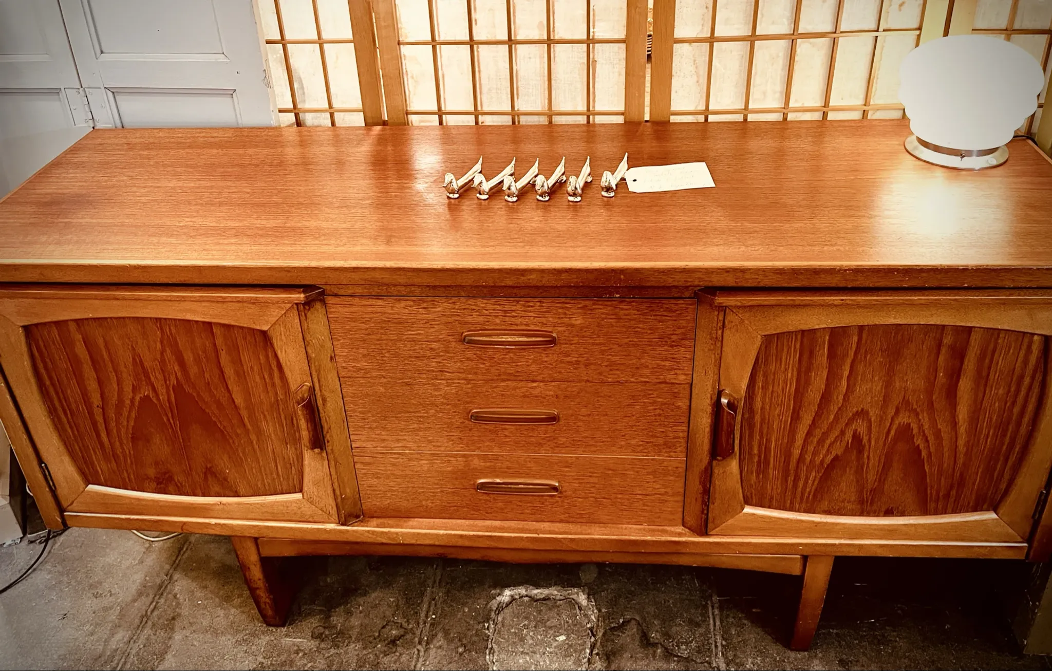 Classic British mid-century teak enfilade, circa 1960s.