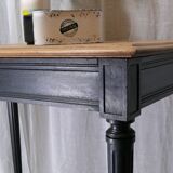 Console noire et bois brut