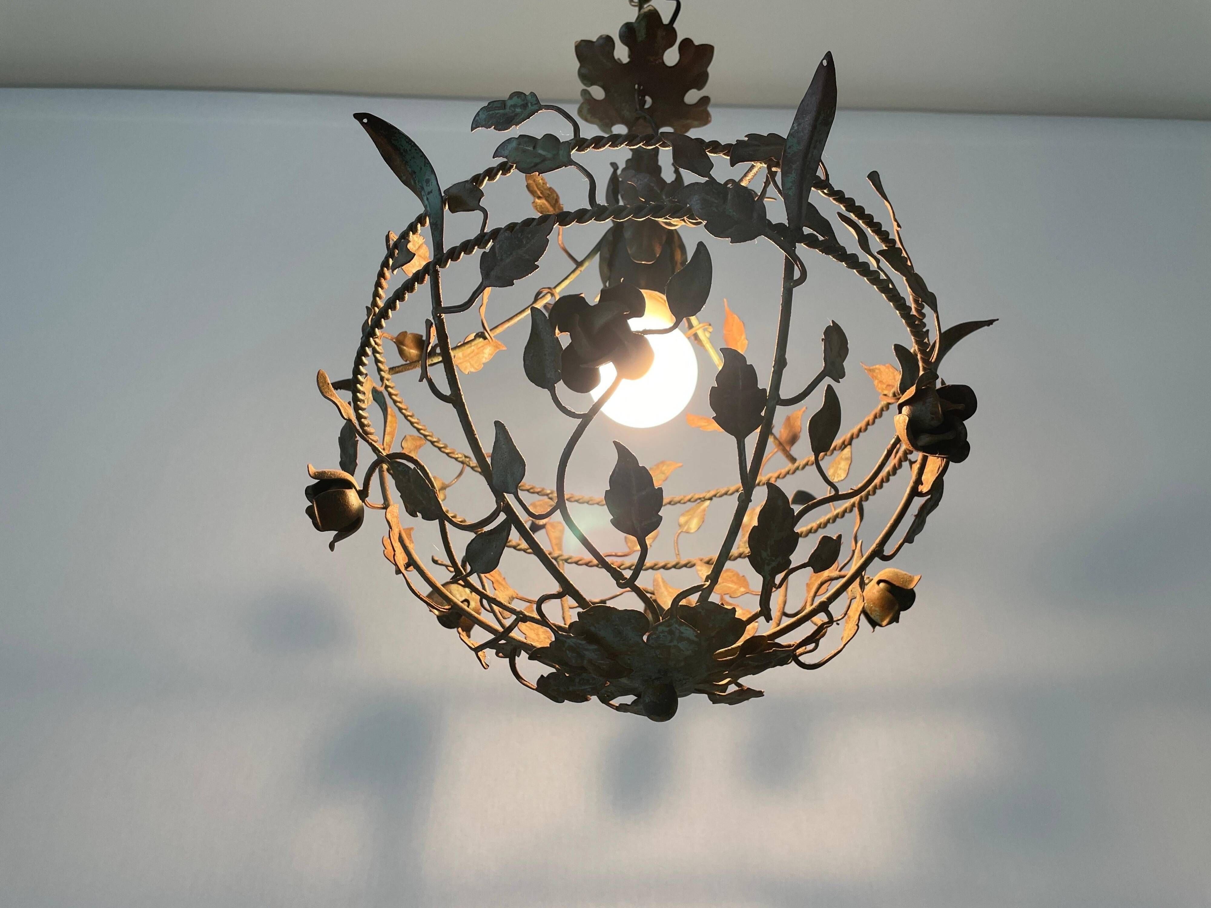 Patinated metal ceiling light with a floral and leaf pattern, 1950s, Italy.