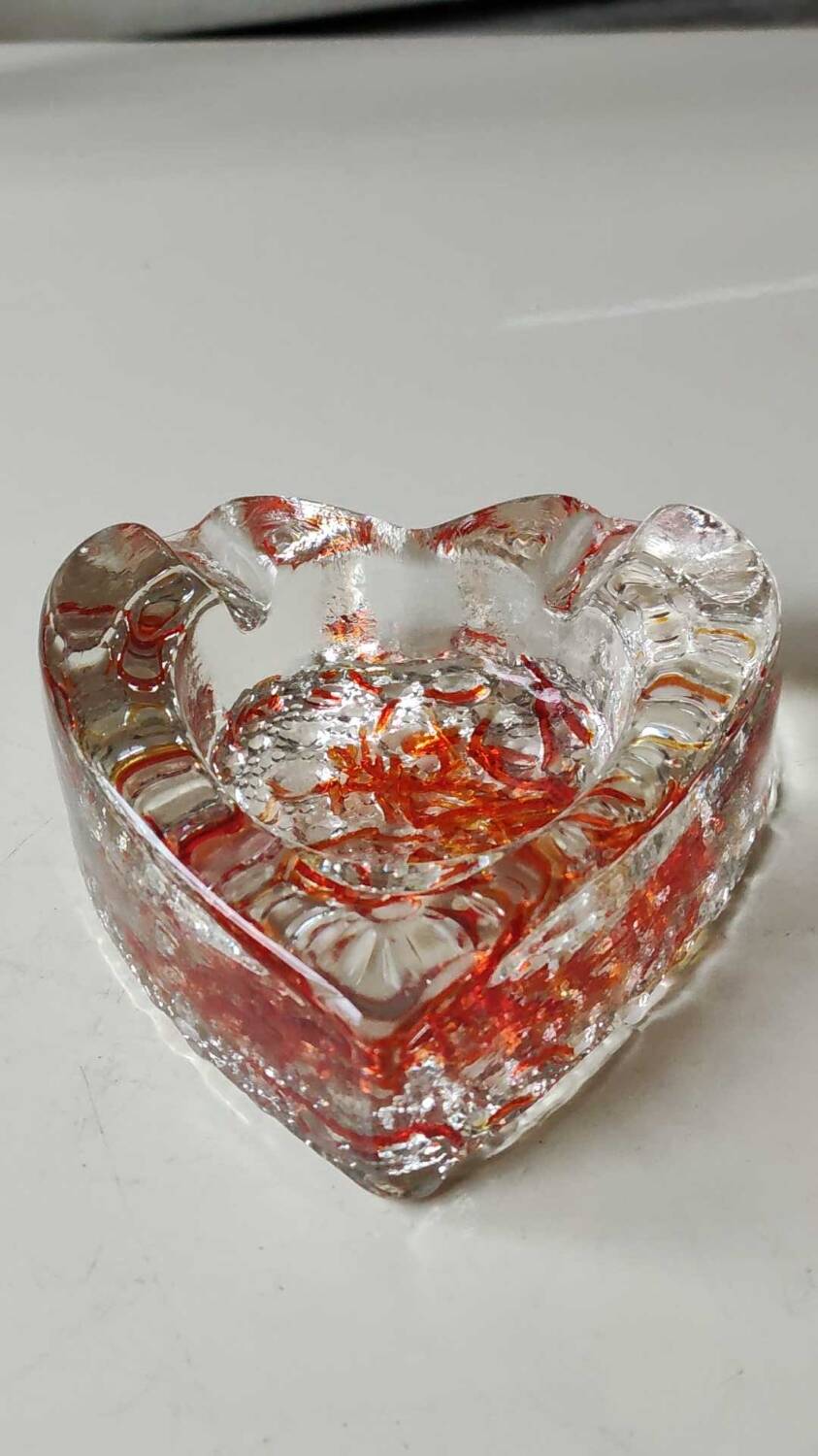 Empty pocket/Ashtray, l in blown art glass/Heart shape with inclusions of orange filaments. In Murano style
