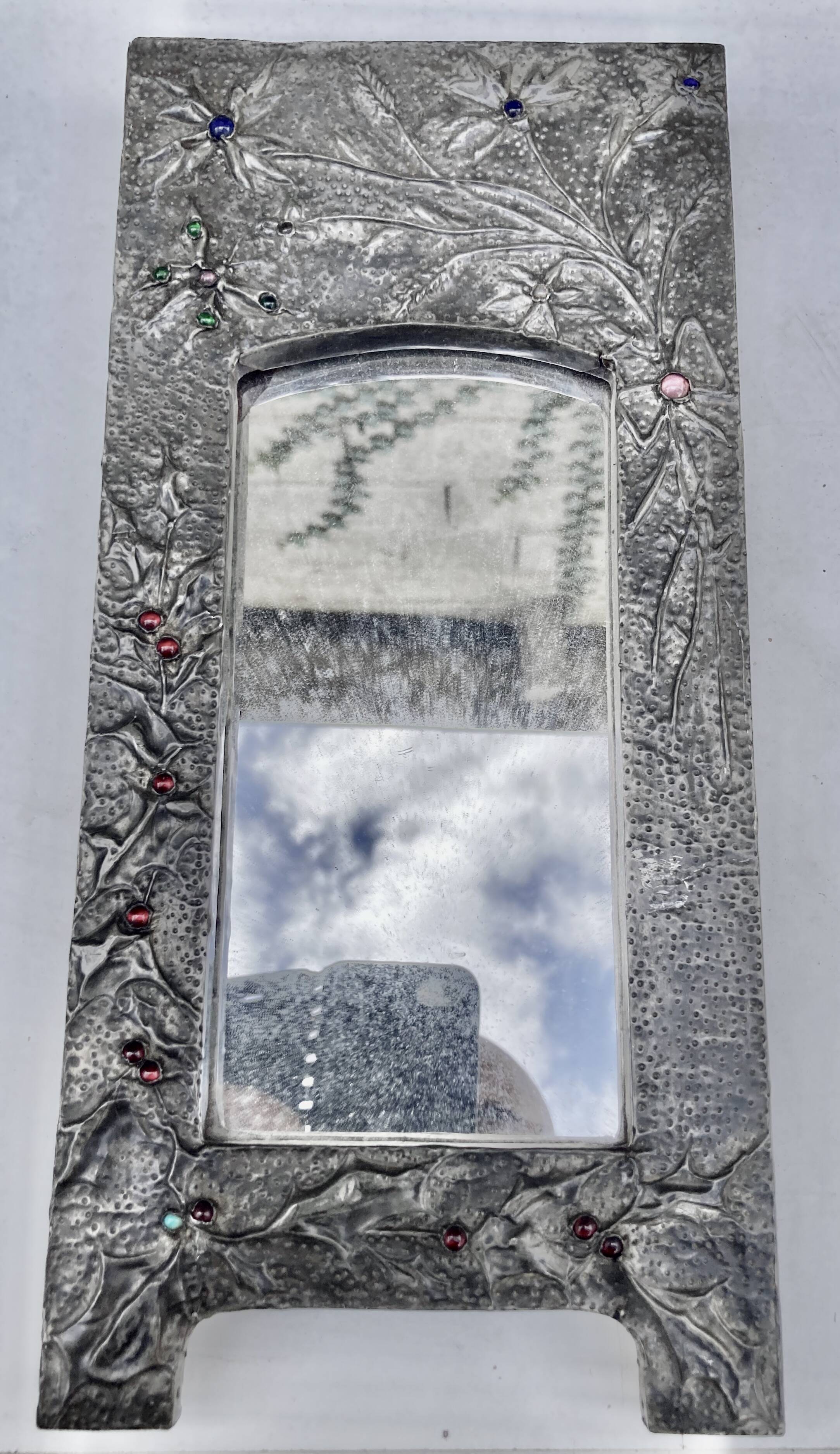 Mirror with embossed metal frame by alfred daguet, 1900s art nouveau period