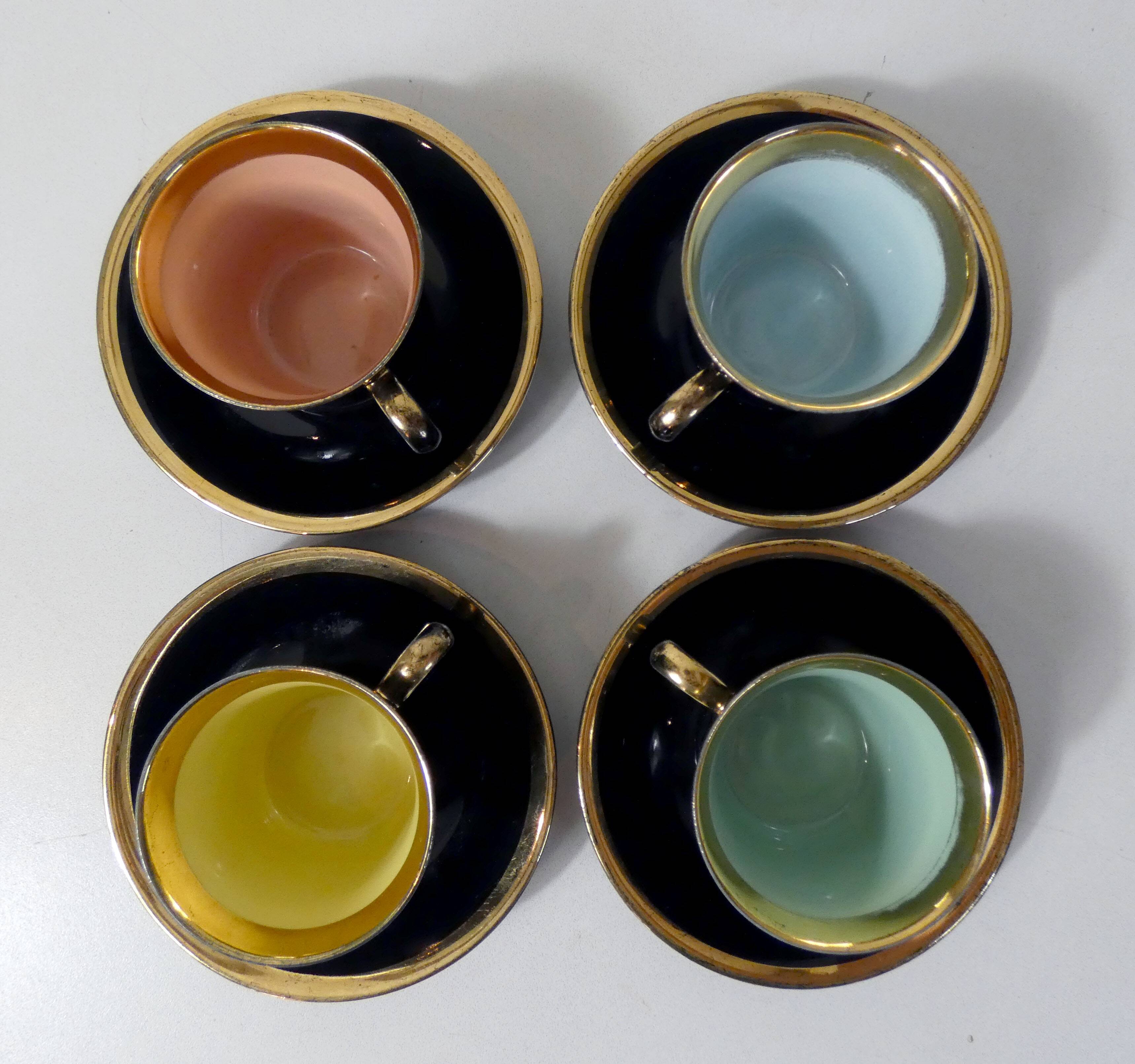 4 old black and gold cups in Vintage color
