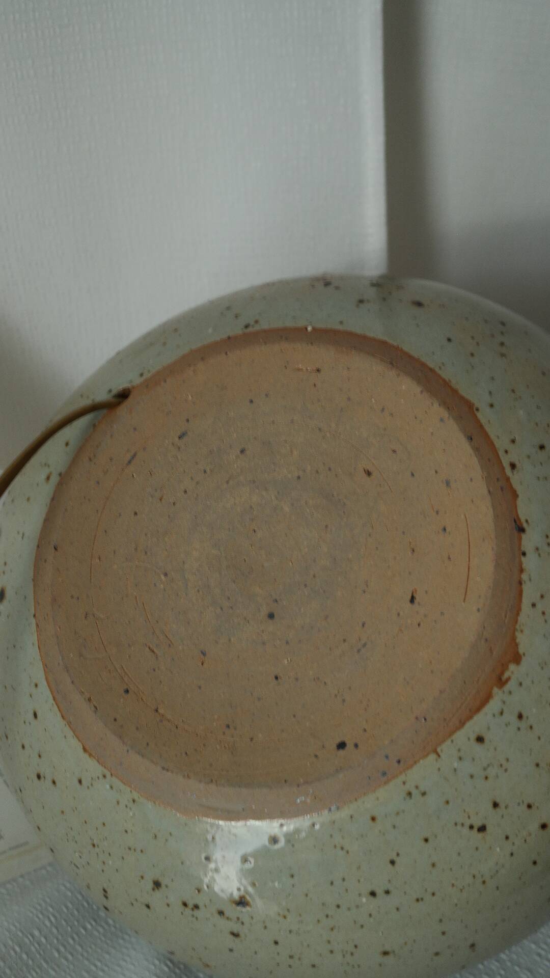 Vintage ceramic lamp with a wool shade.