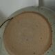 Vintage ceramic lamp with a wool shade.
