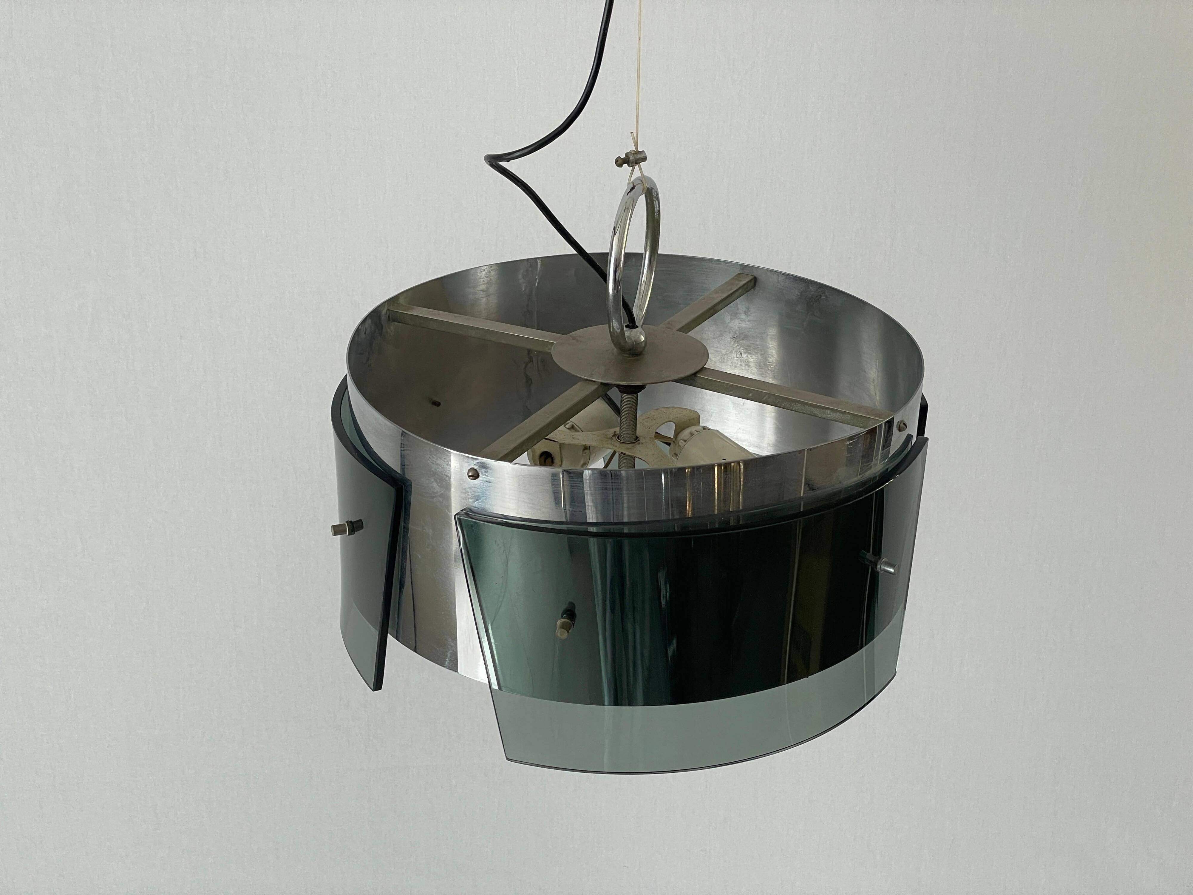 Suspended lamp in green glass and chrome, 1960s, Italy