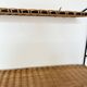 Raoul Guys rattan wall shelf 1950