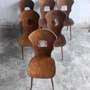 Set of six plywood dining chairs by Baumann, France, 1950s.