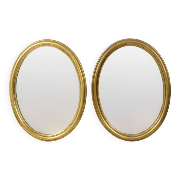 Paire de miroirs ovales en feuille d'or, France, 20e siècle