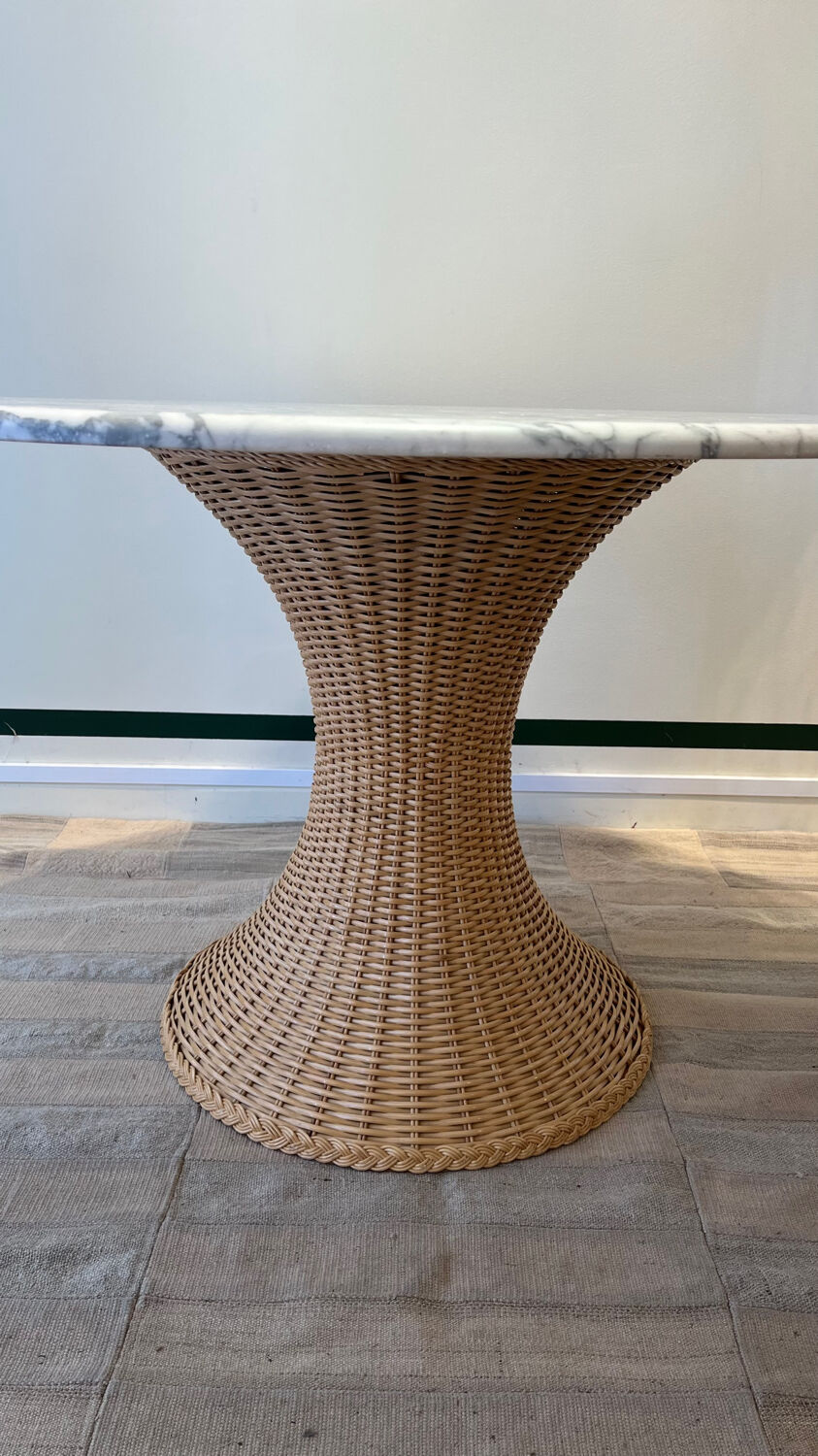 Marble and wicker dining table