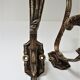 Four patères bronze patinated leafy décor early 20th century