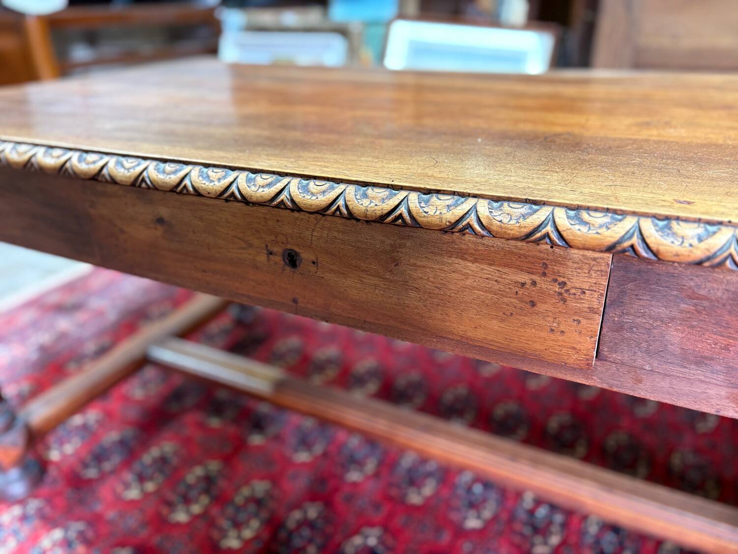 Large antique carved wooden desk in Renaissance style