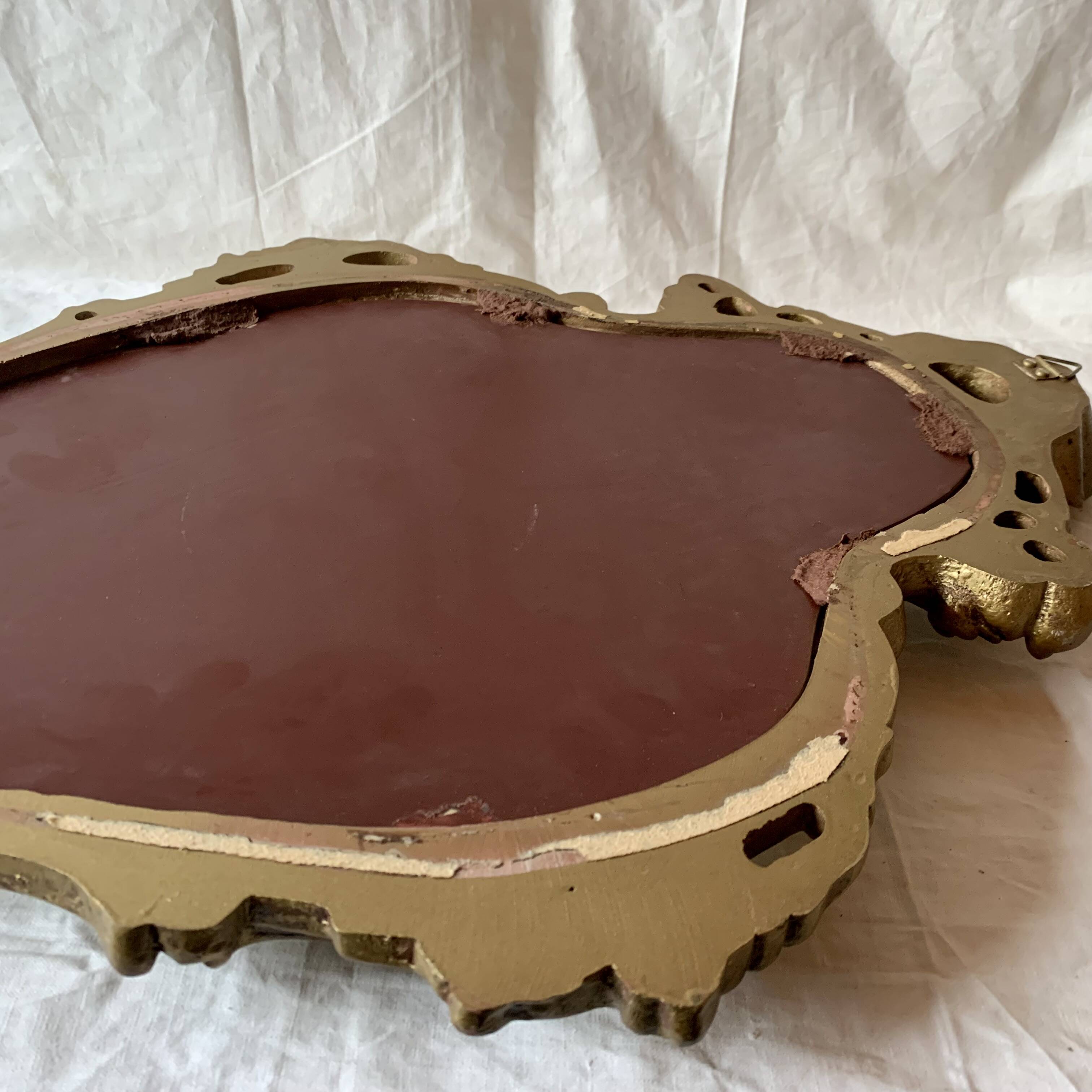 Vintage shell mirror in gold plaster