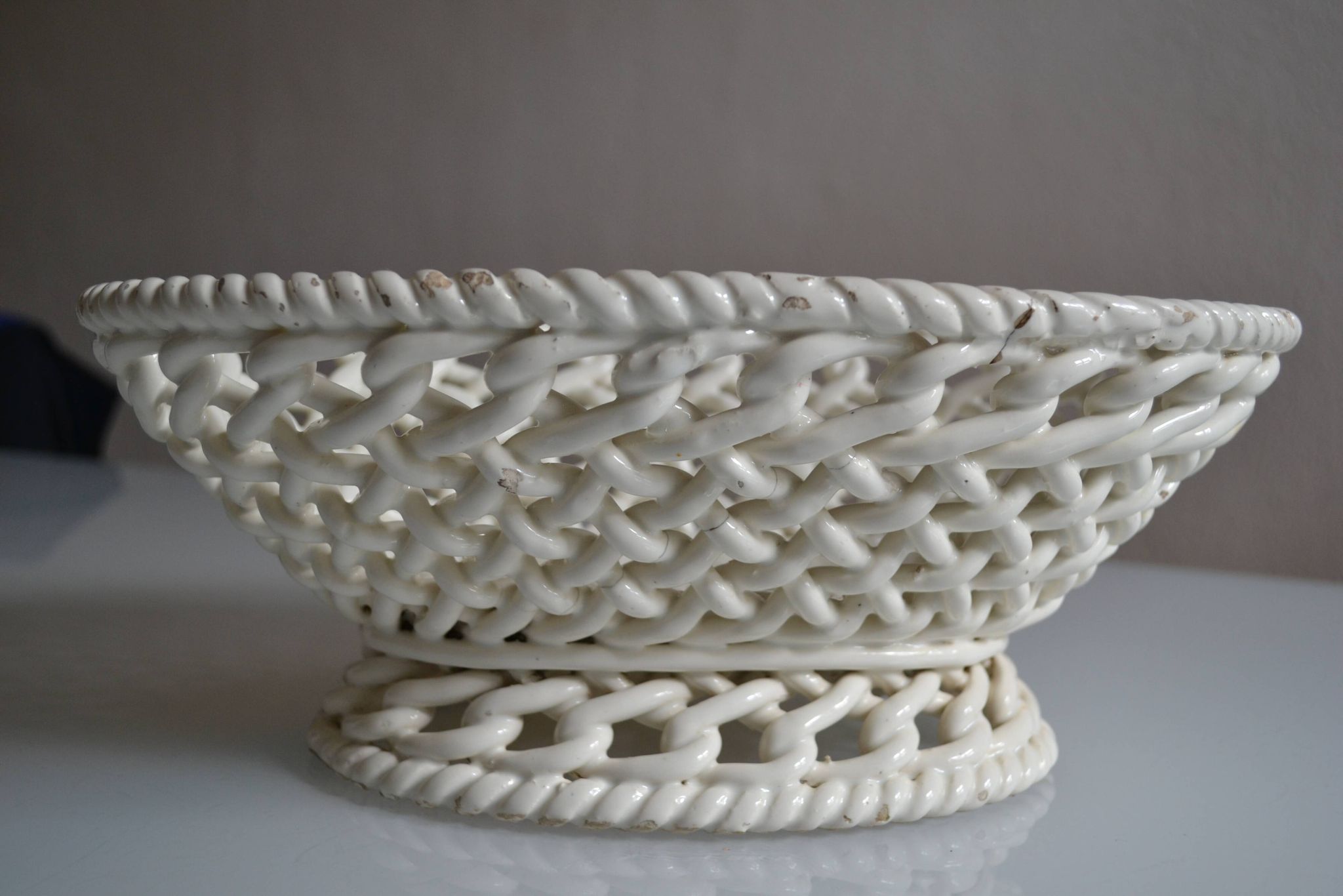 Woven ceramic oval fruit bowl or dish
