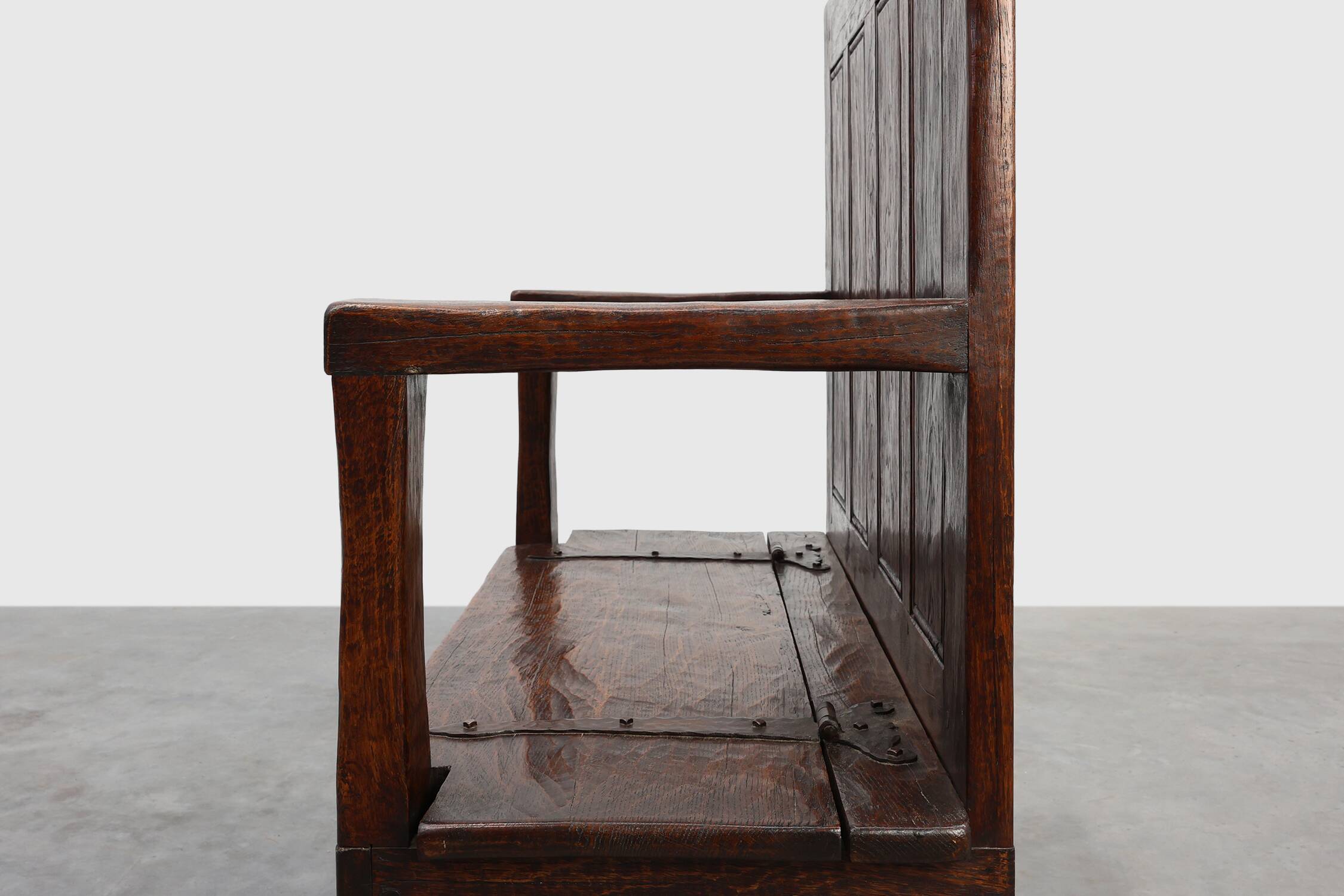 Rustic solid oak carved bench with storage compartment, France 19th century