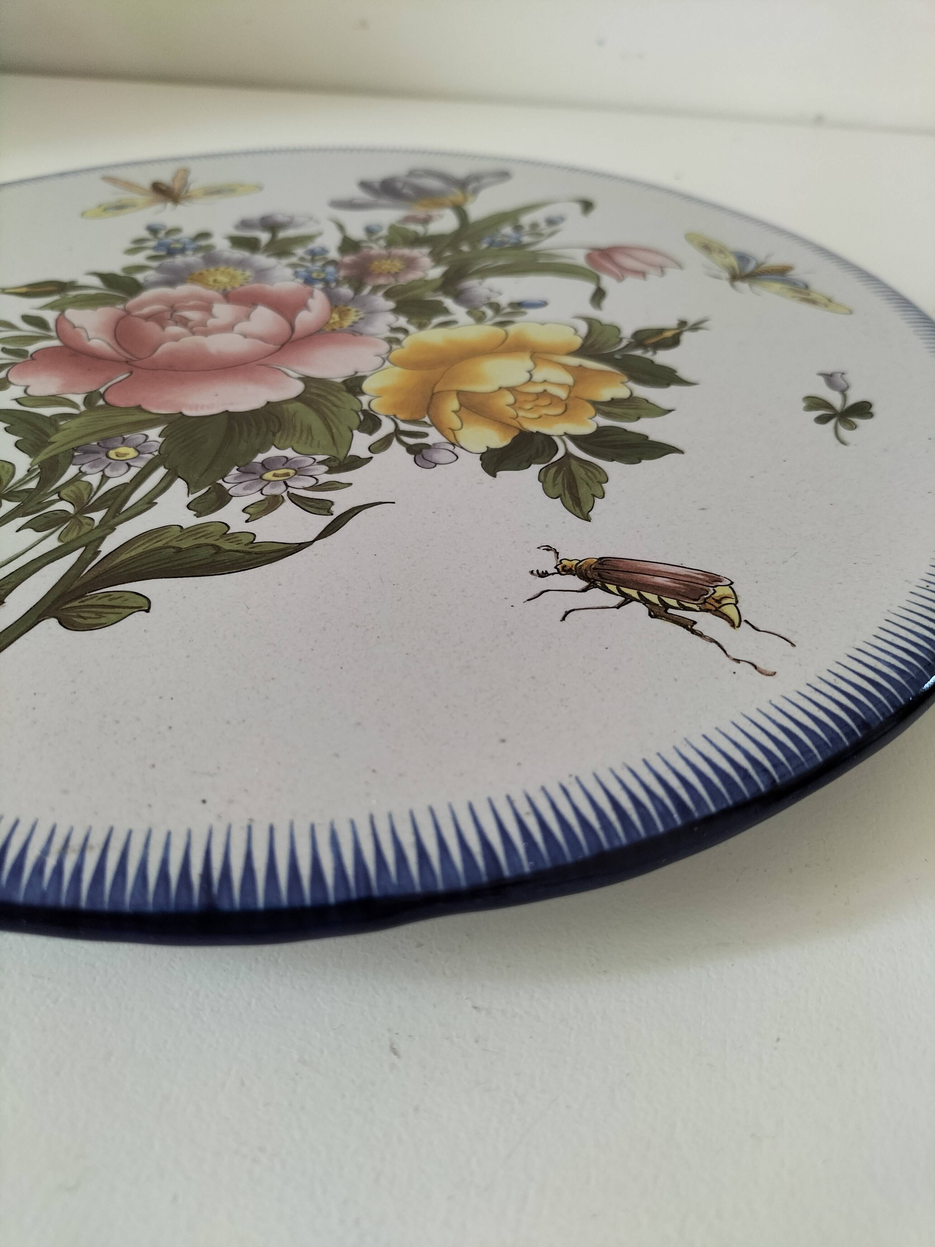 Decorative earthenware plate signed Charolles