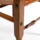 Rare 1990s safari stool with a teak frame and a seat made of brown saddle l