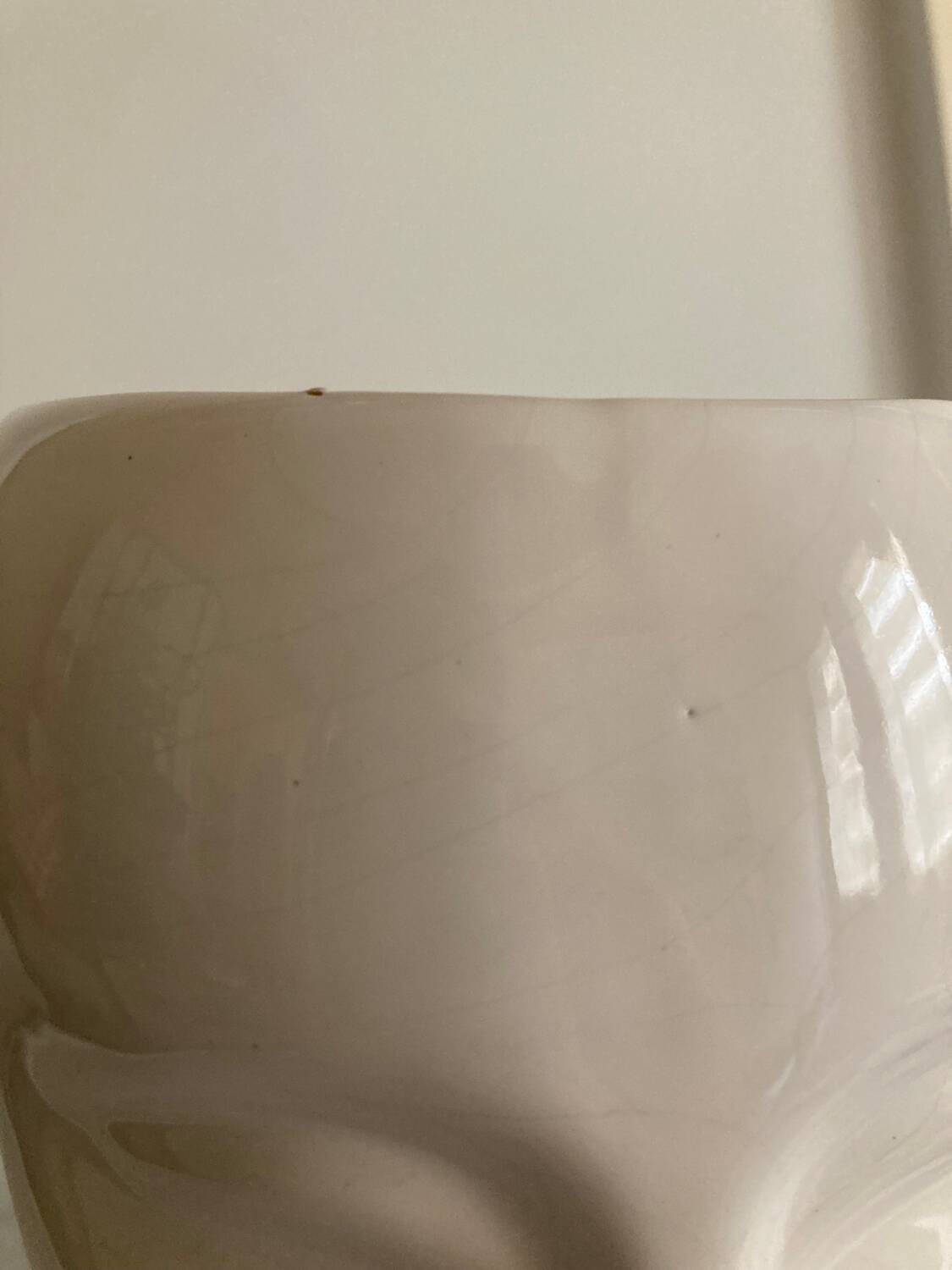 Vintage white ceramic face-shaped vase or planter