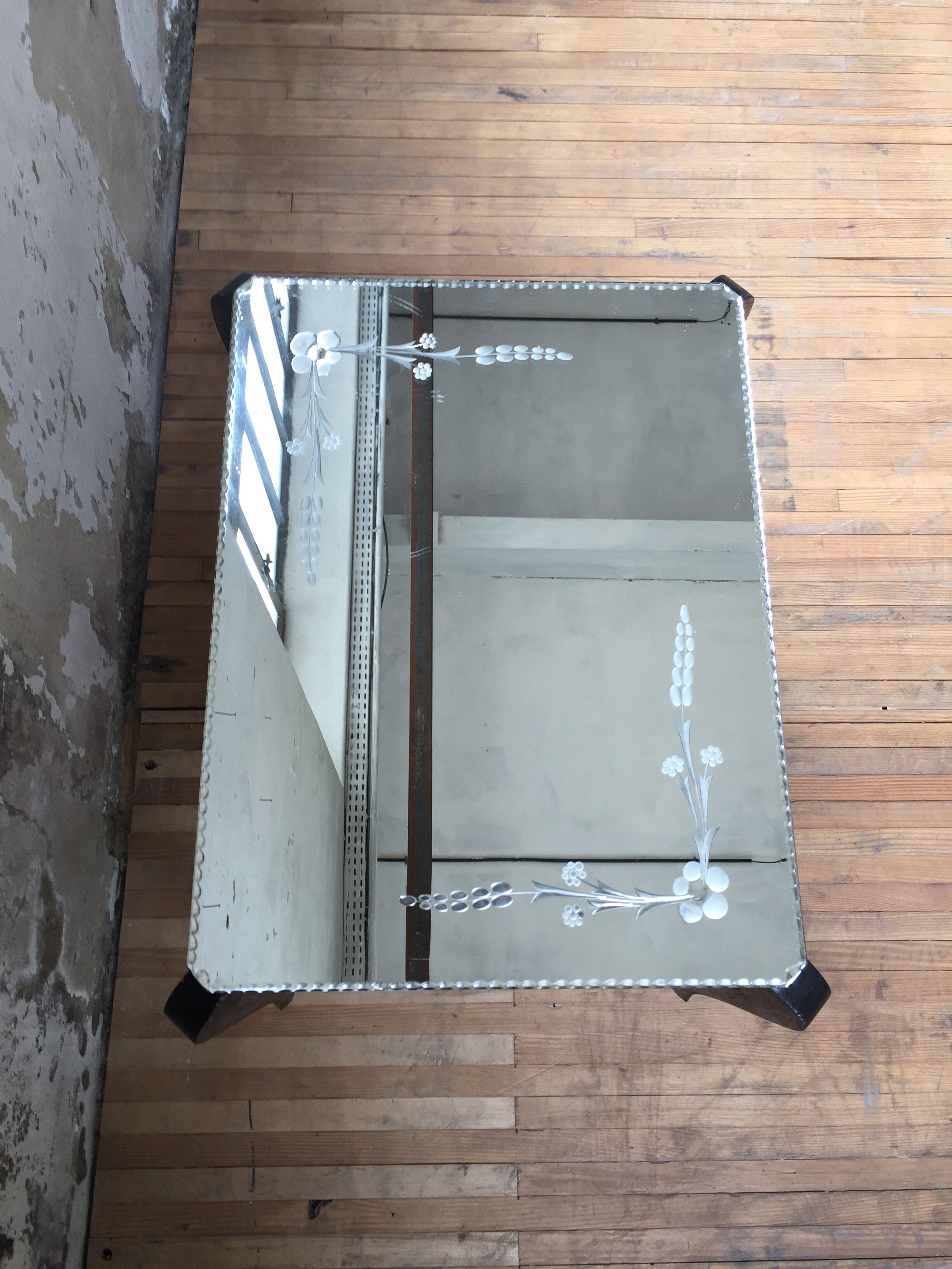 Bevelled mirror coffee table