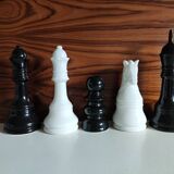 5 black and white ceramic chess pieces