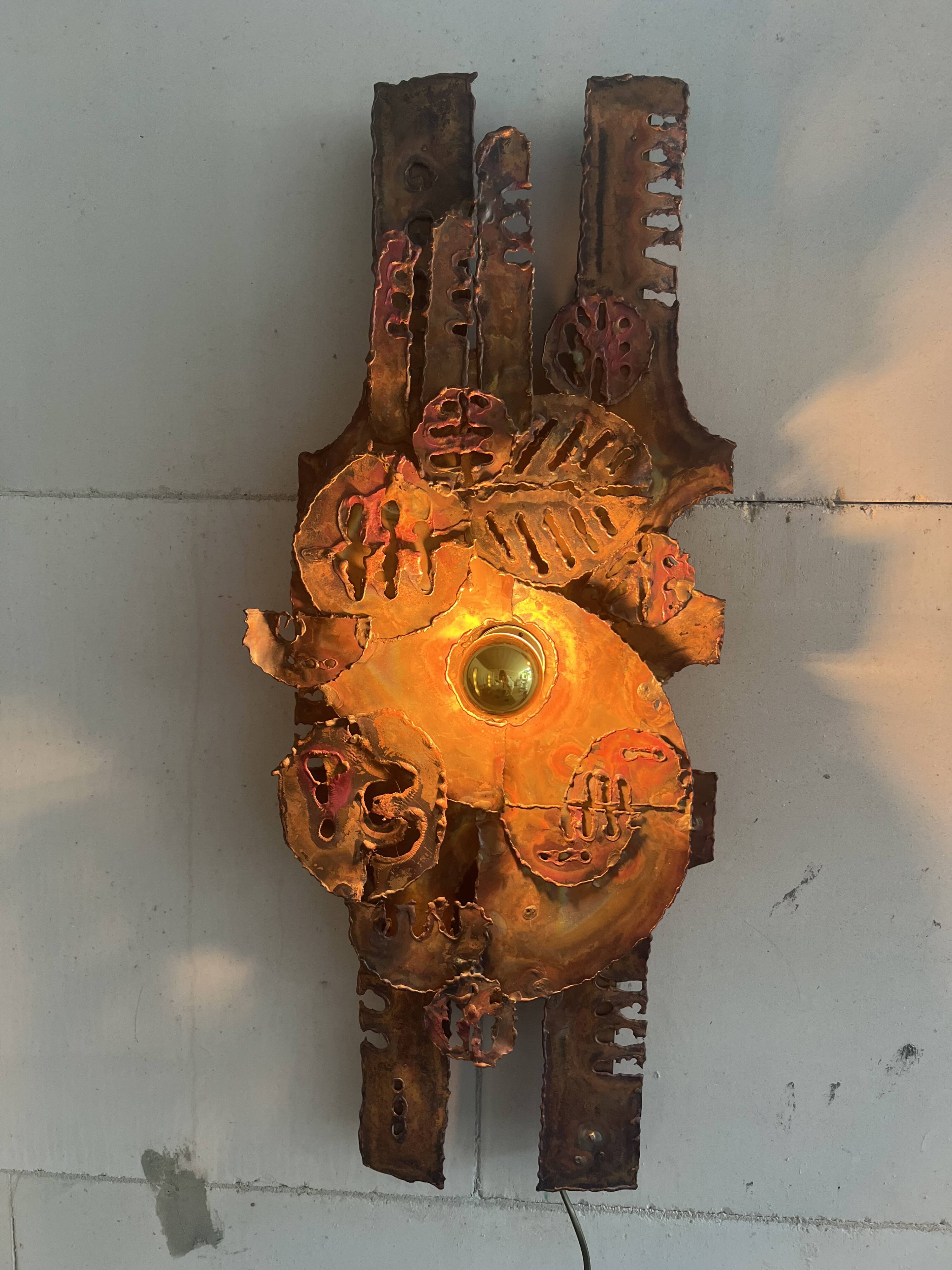Raw expressive wall sconces by Francesco Pasinato