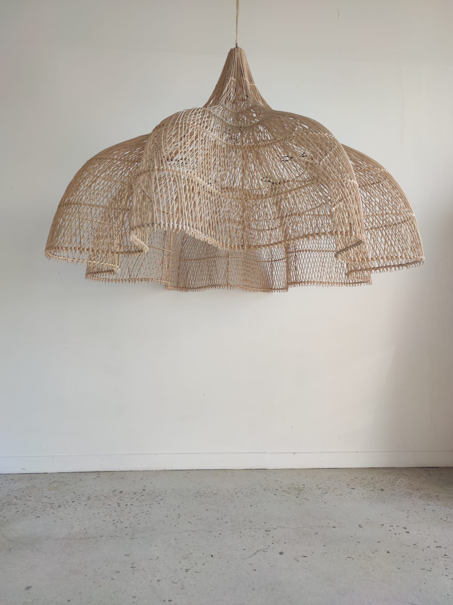 Huge rattan suspension in the shape of a corolla H:1m; D: 1m50