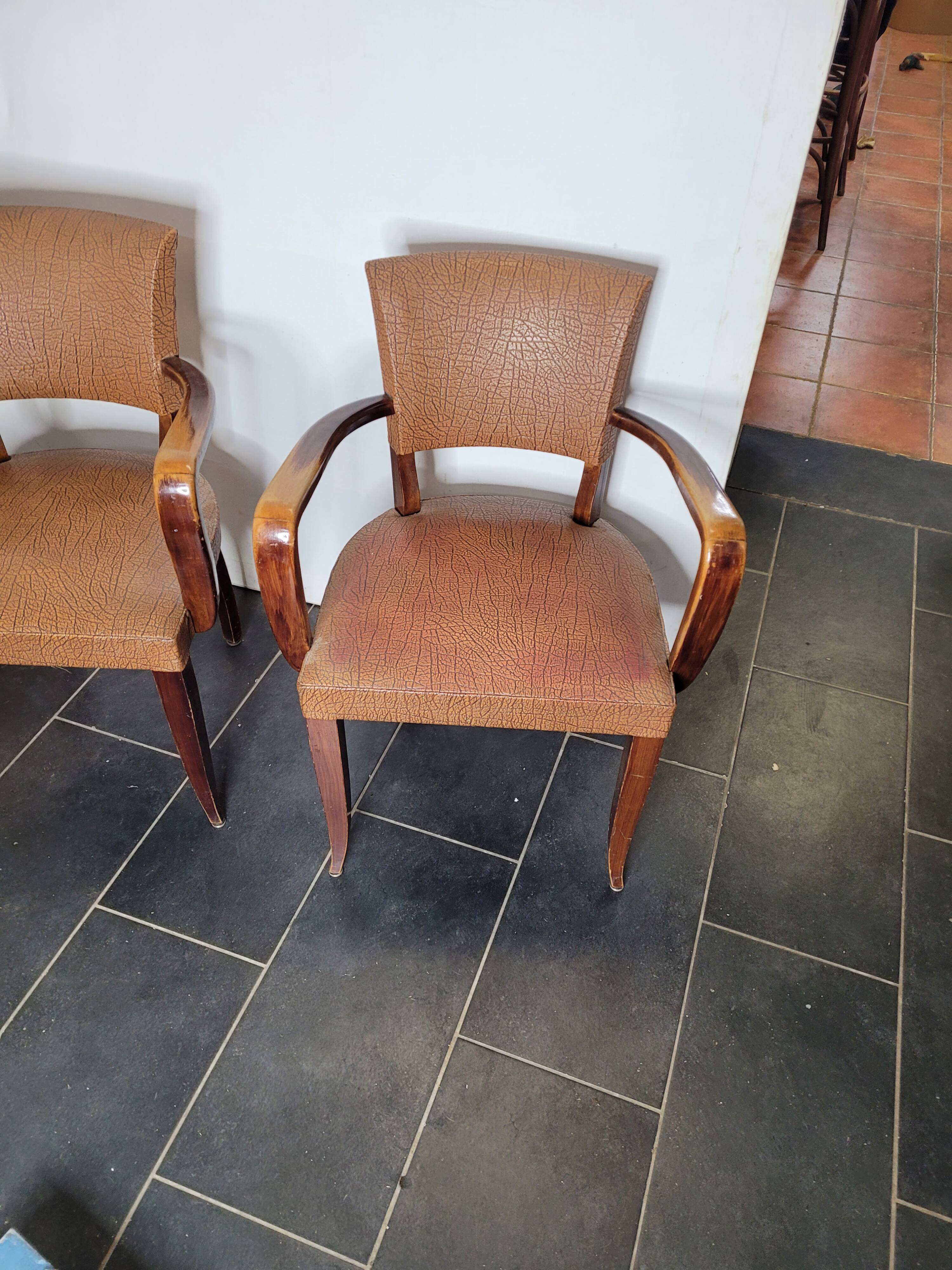 Pair of skai bridge armchairs