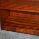 Pair of open low bookshelves Shaws of London in hardwood.