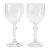 A pair of engraved crystal wine glasses