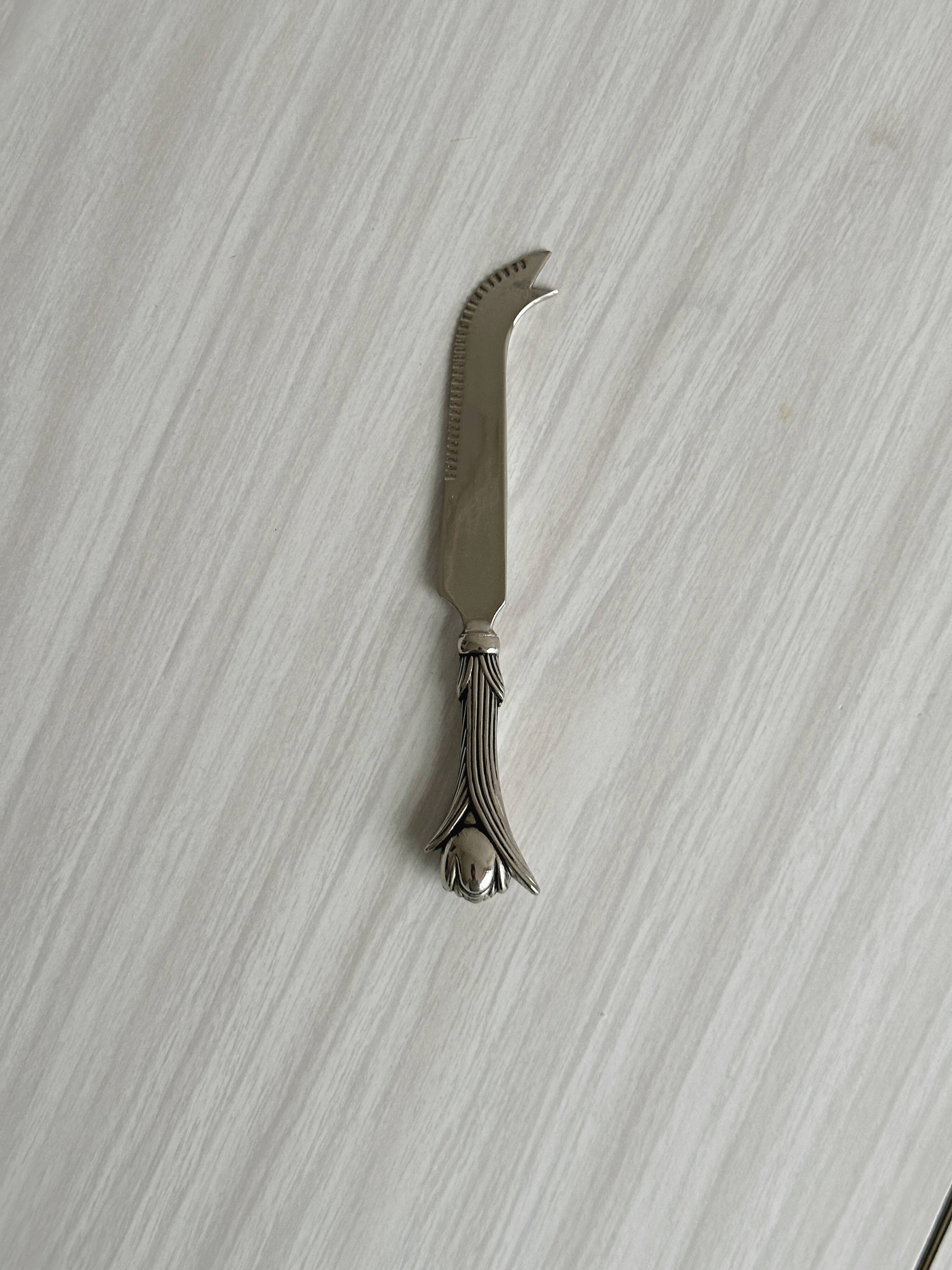 silver-plated cutlery with tulip design