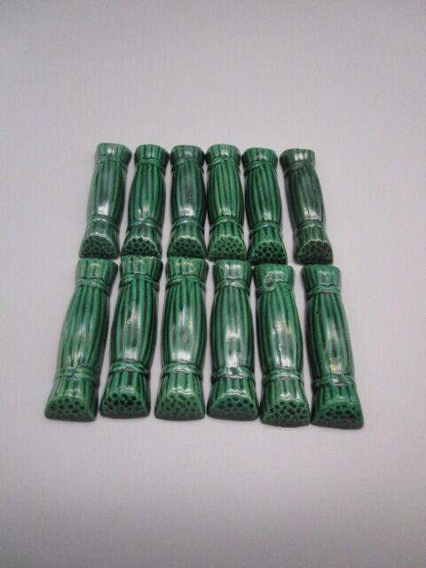 12 vintage ceramic knife holders
