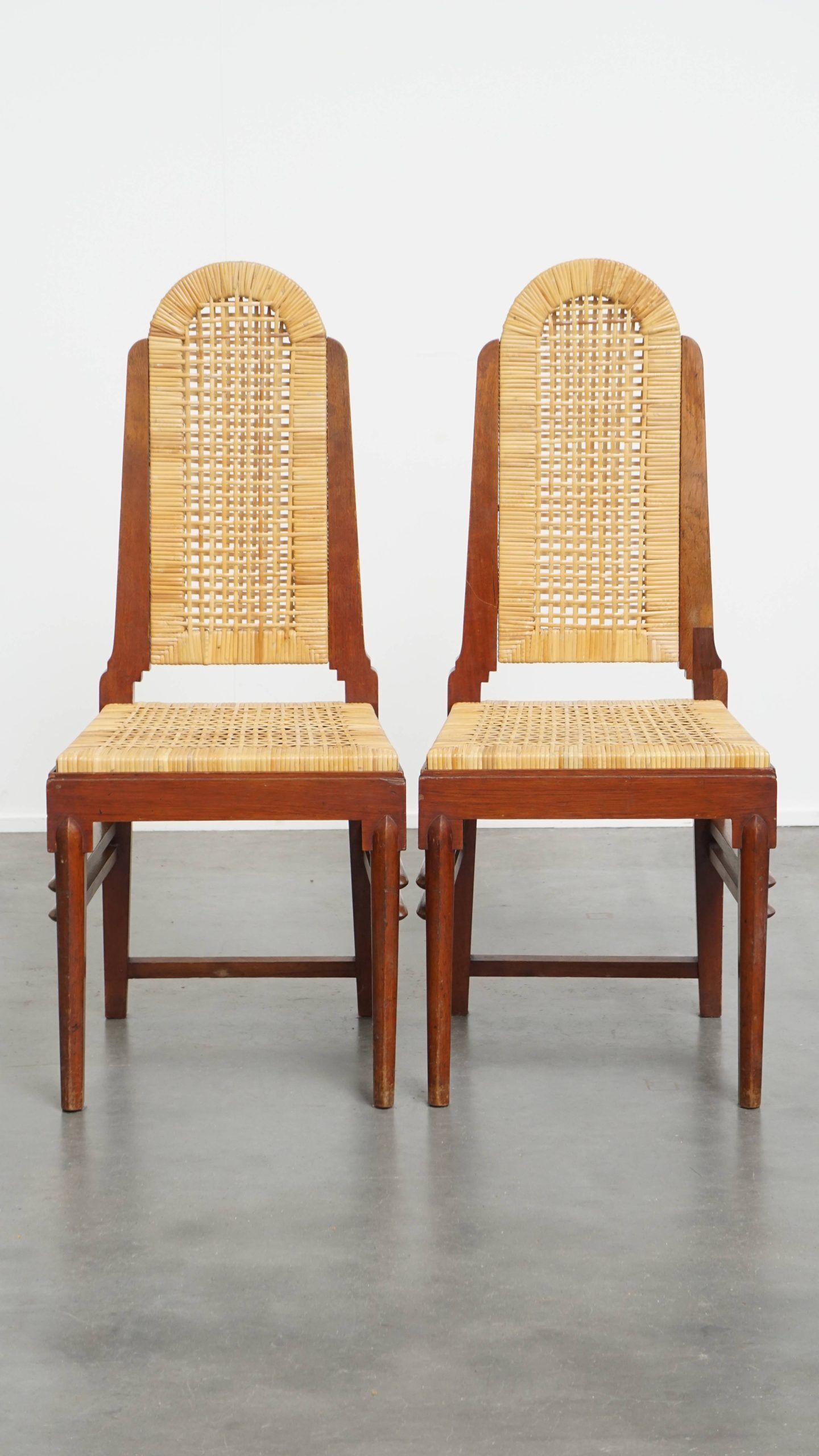 Set of four rattan Art Deco design dining chairs with high back