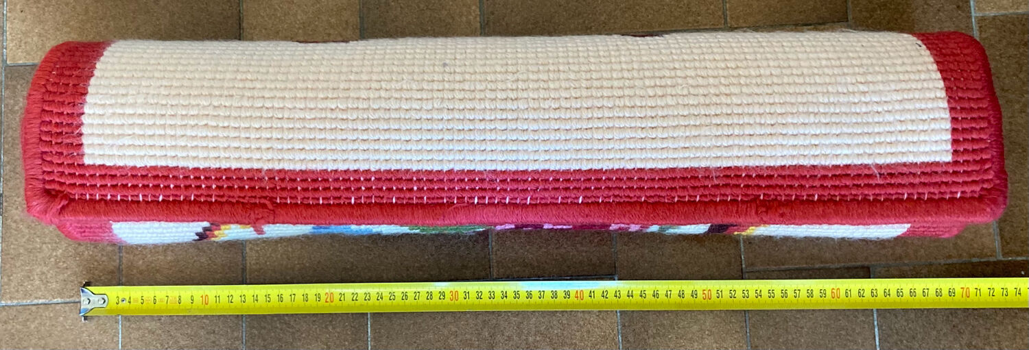 Vintage wool rug with floral decor