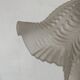 Antique swan neck wall light in brass and porcelain with a glass shade.