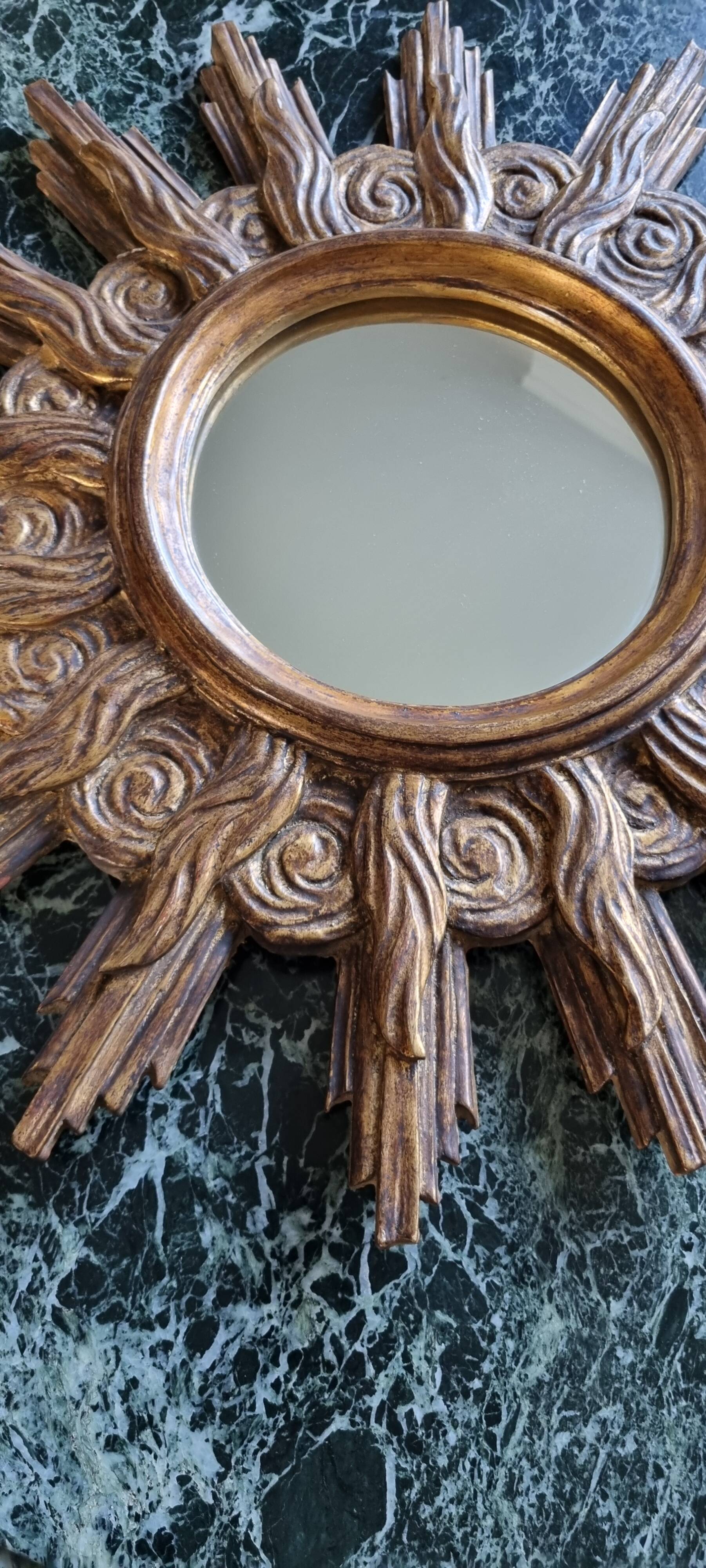 Vintage wooden and gold sun mirror