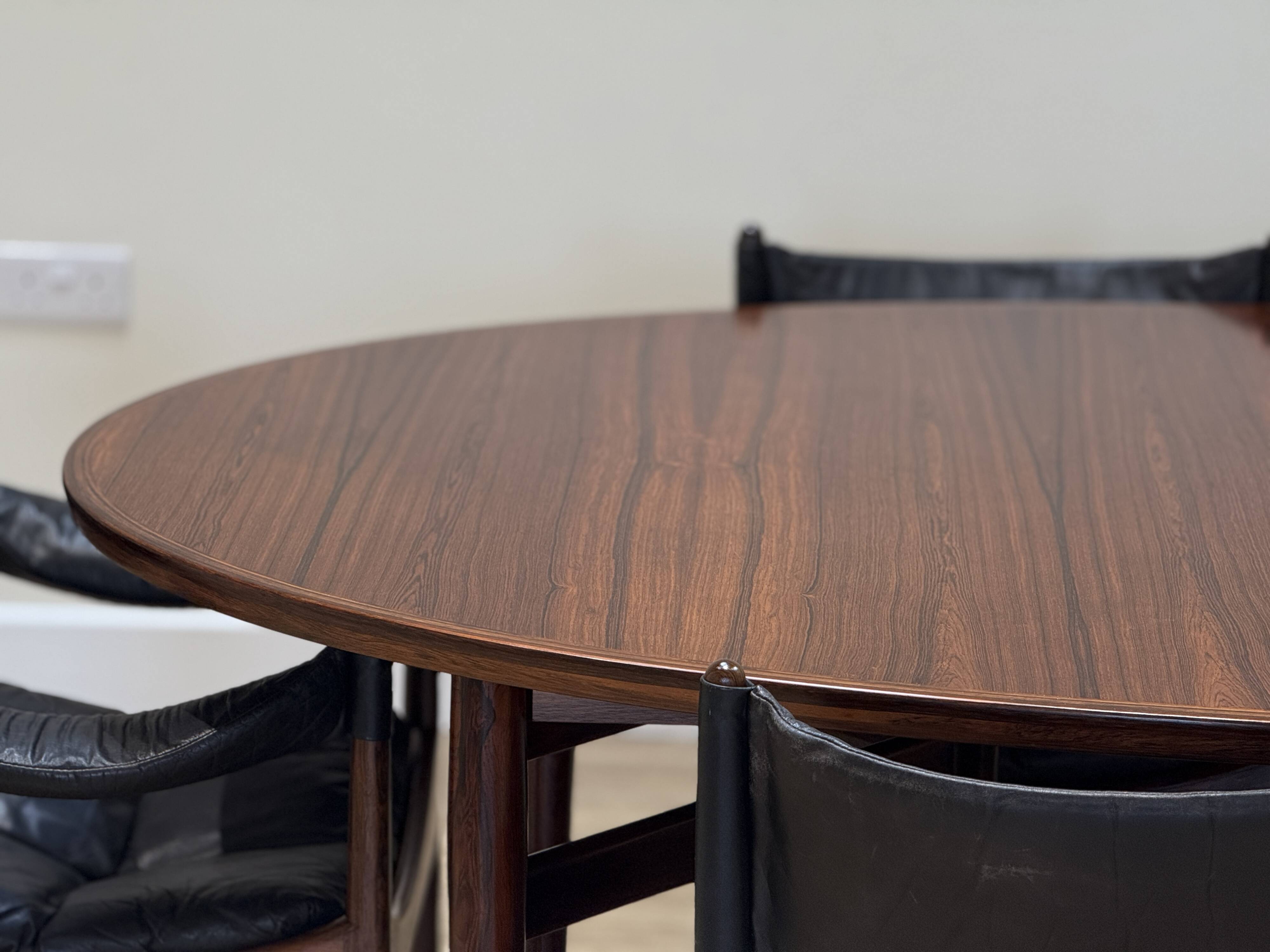 Extendable dining room table and chairs (by Kristian Solmer Vedel)