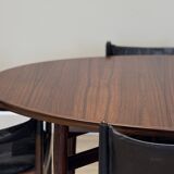 Extendable dining room table and chairs (by Kristian Solmer Vedel)