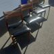 Scandinavian chairs in teak and black skaï.