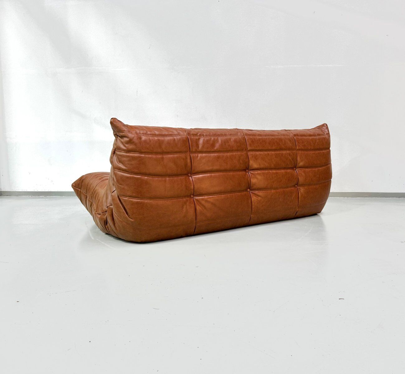 Togo sofa in cognac cowhide by Michel Ducaroy for Ligne Roset.